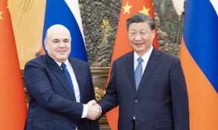 【视频】习近平、李强分别会见俄总理 习近平：愿为各国发展提供新机遇
