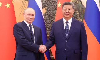 习近平与普京会谈 称中俄关系是互利合作共赢的大国关系典范